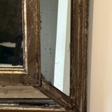 Antique mirror with wooden ornaments