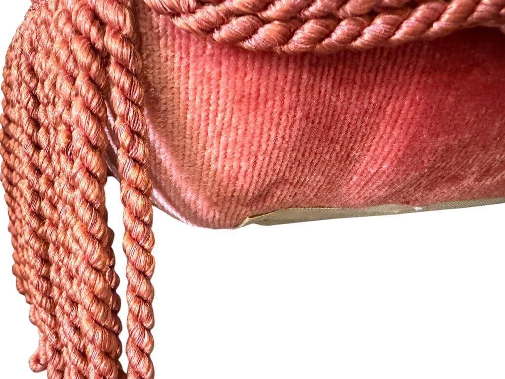 Set of 2 vintage old rose armchairs with fringes.