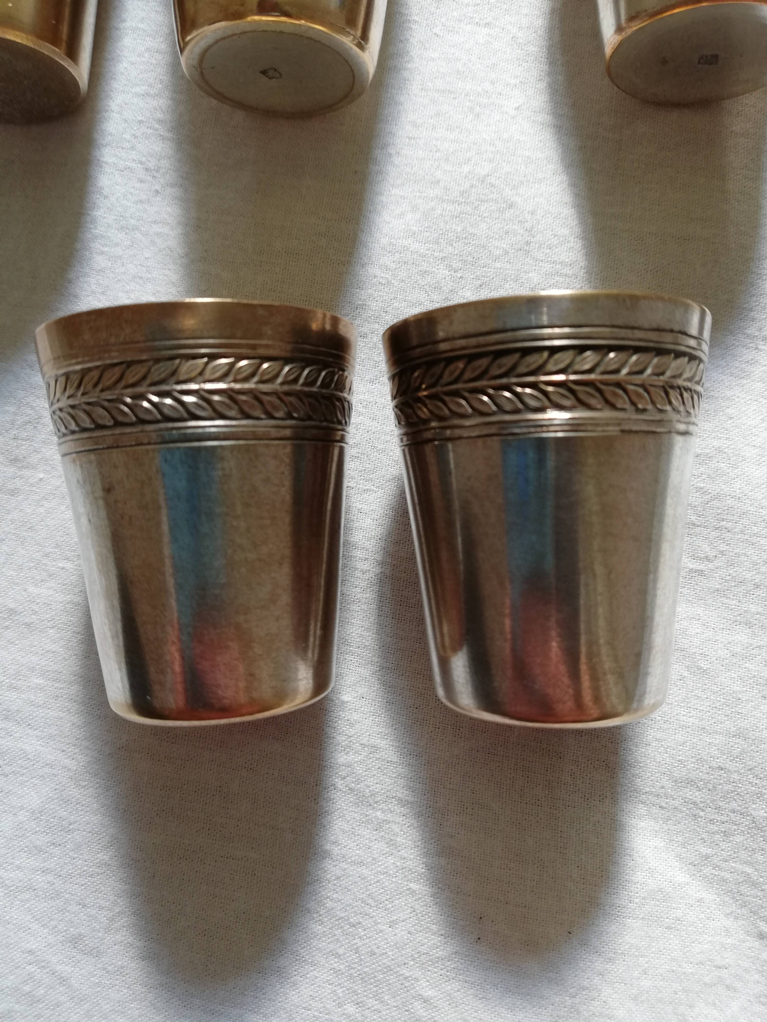 10 silver metal cups