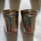 10 silver metal cups