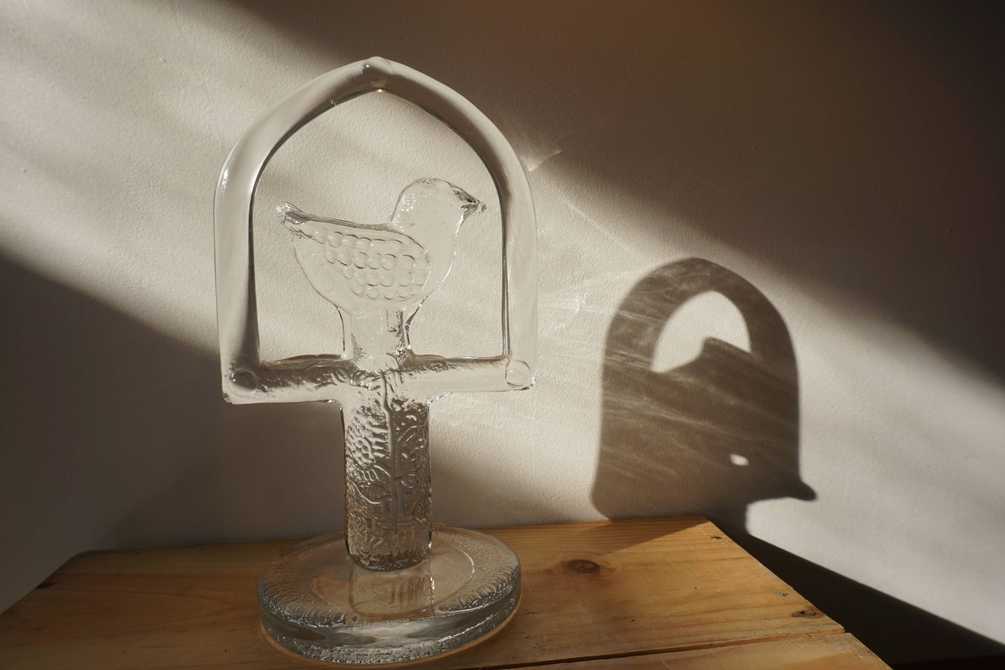 Glass bird suncatcher sculpture