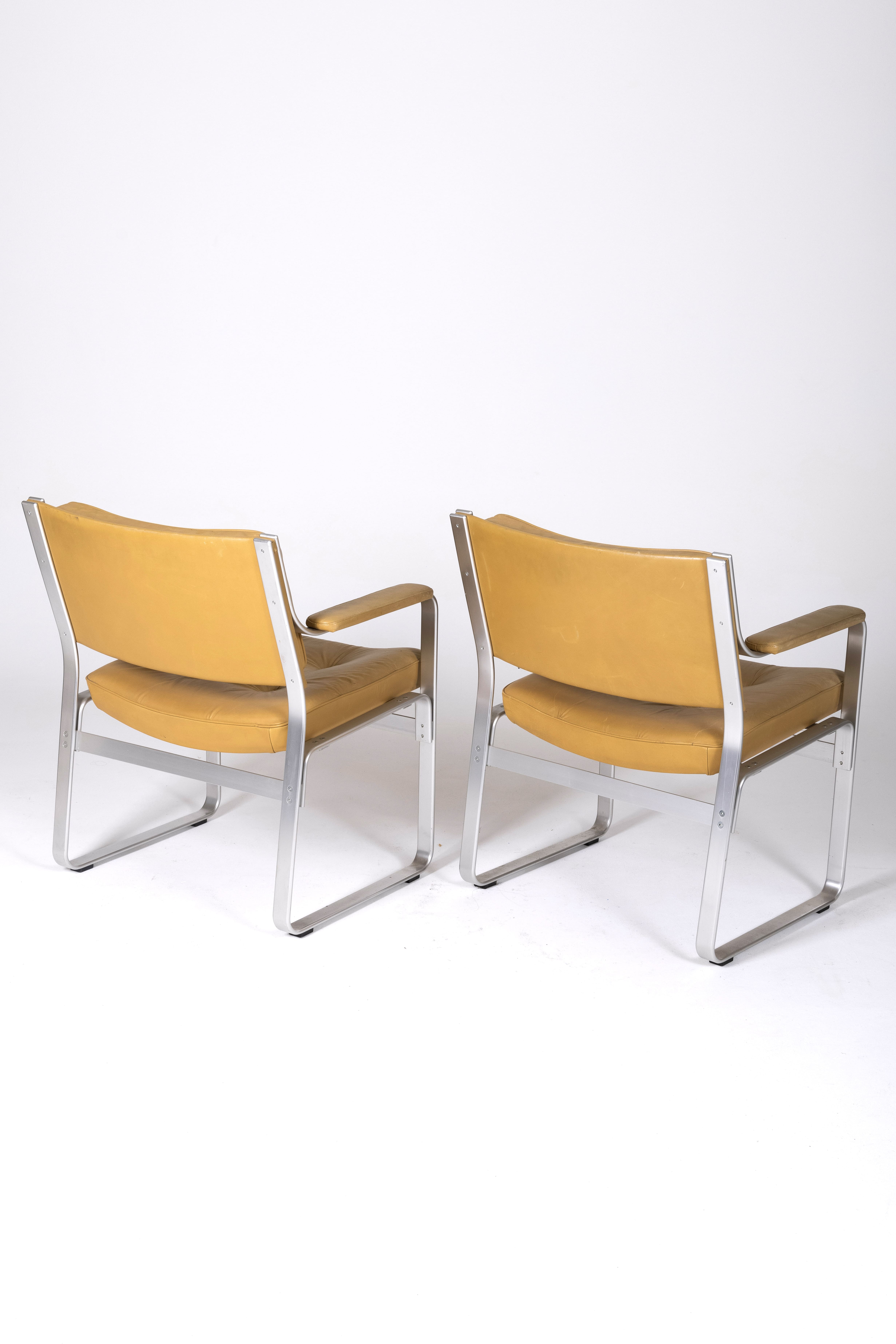 Leather and aluminum armchairs "Karl" by Erik Ekselius, 1960s