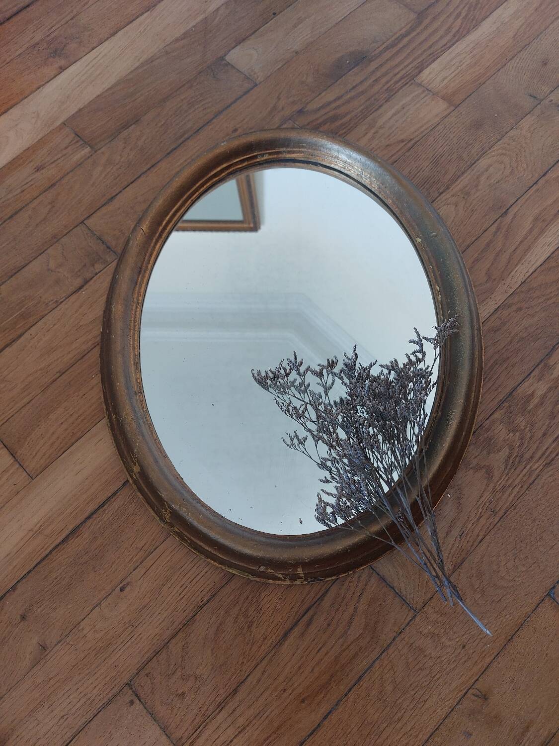 Vintage oval gilded wood mirror