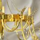 Grand Lustre en Bronze Doré style Directoire Dix Lumières Lucien Gau