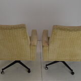 Pair of mid-century swivel armchairs with wheels 1970's