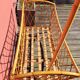 Bamboo and rattan baby cot with canopy.
