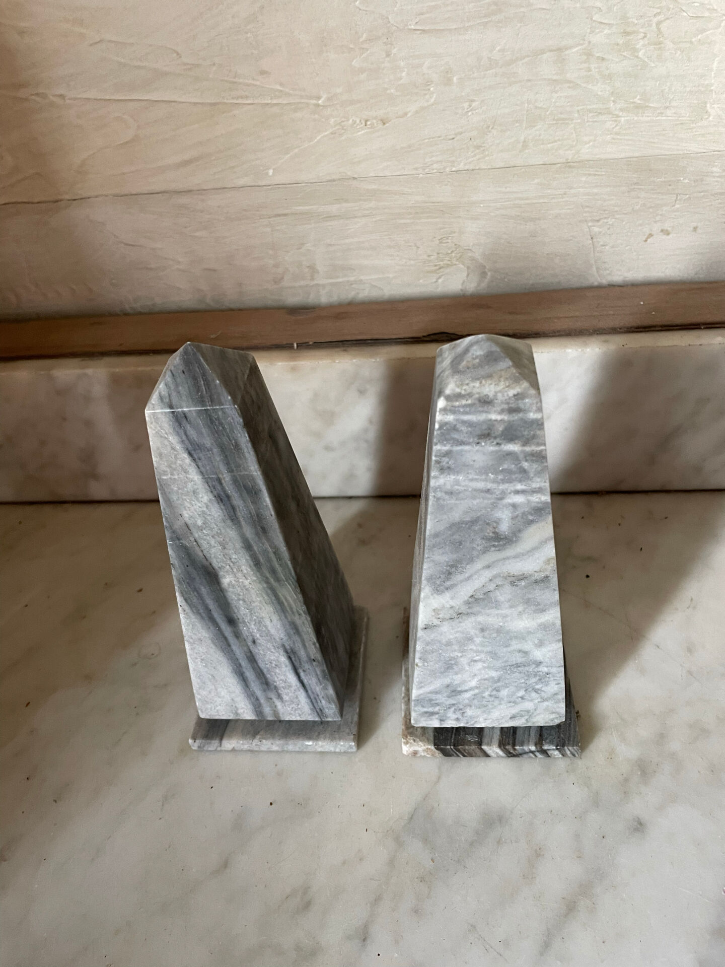 pair of obelisk bookends in marble Art Deco style