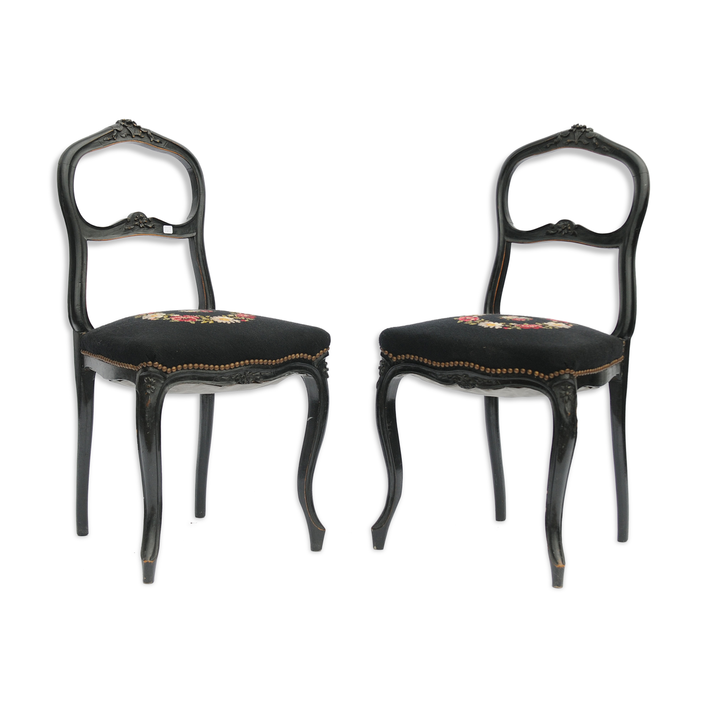 Pair of black Louis XV-style chairs