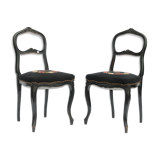 Pair of black Louis XV-style chairs