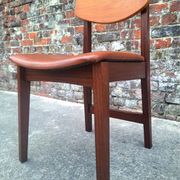 Vintage Scandinavian chair in teak, antique seating furniture.