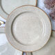 Round dish in tulowice speckled sandstone