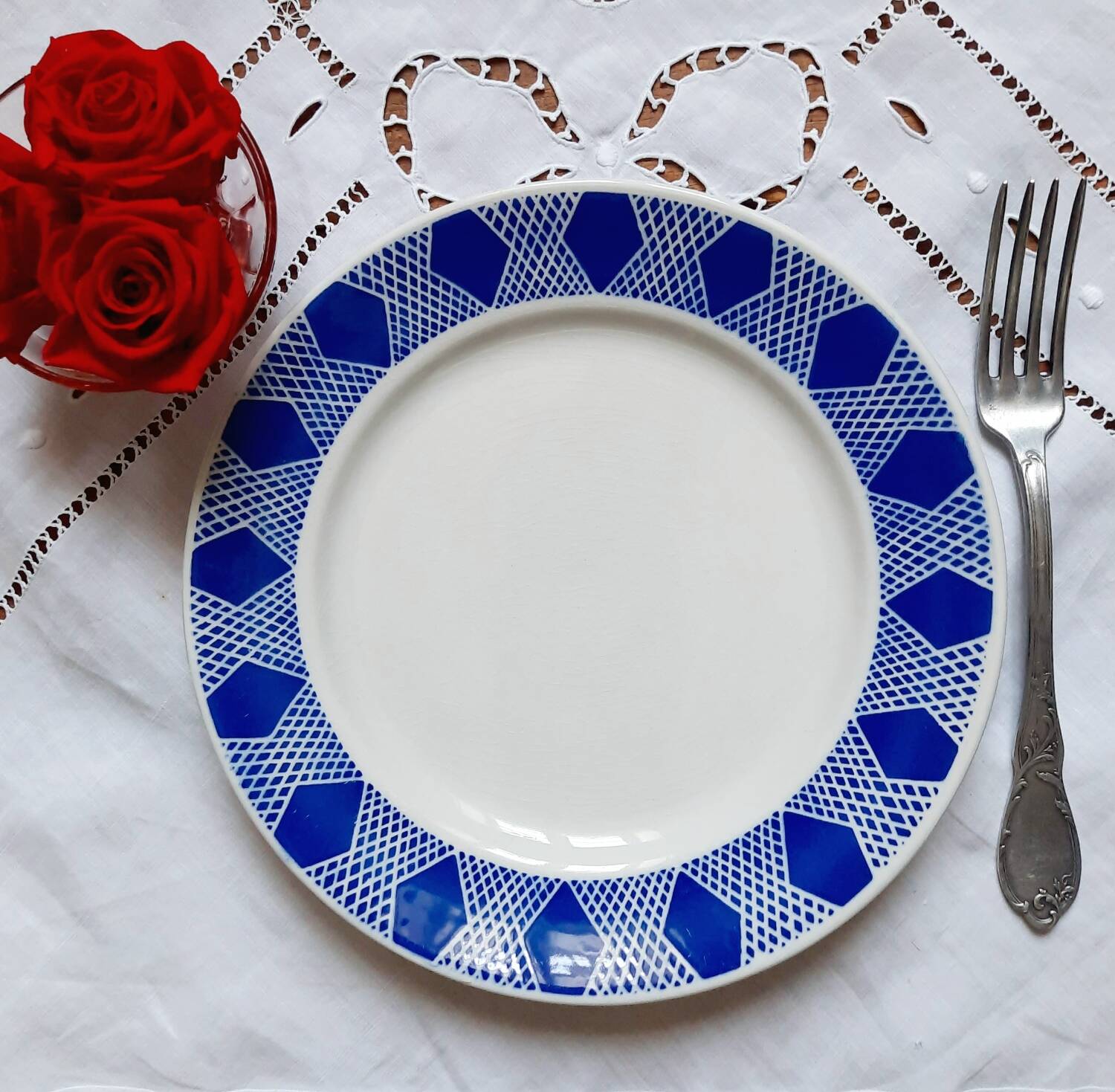 Old mismatched earthenware dinner plates