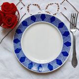 Old mismatched earthenware dinner plates