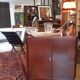 Meuble vintage musique placage acajou sur roulettes