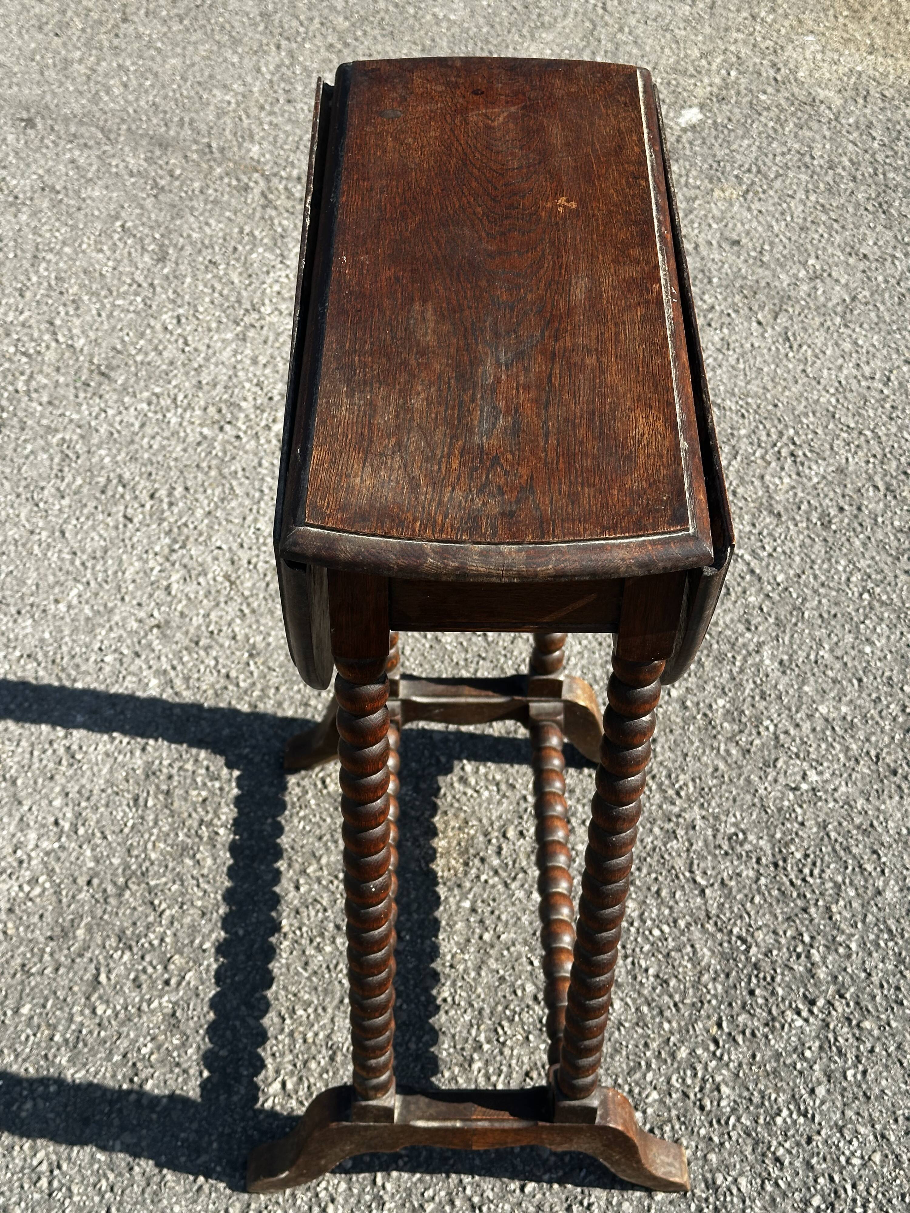 Small folding table called Gateleg, Victorian era