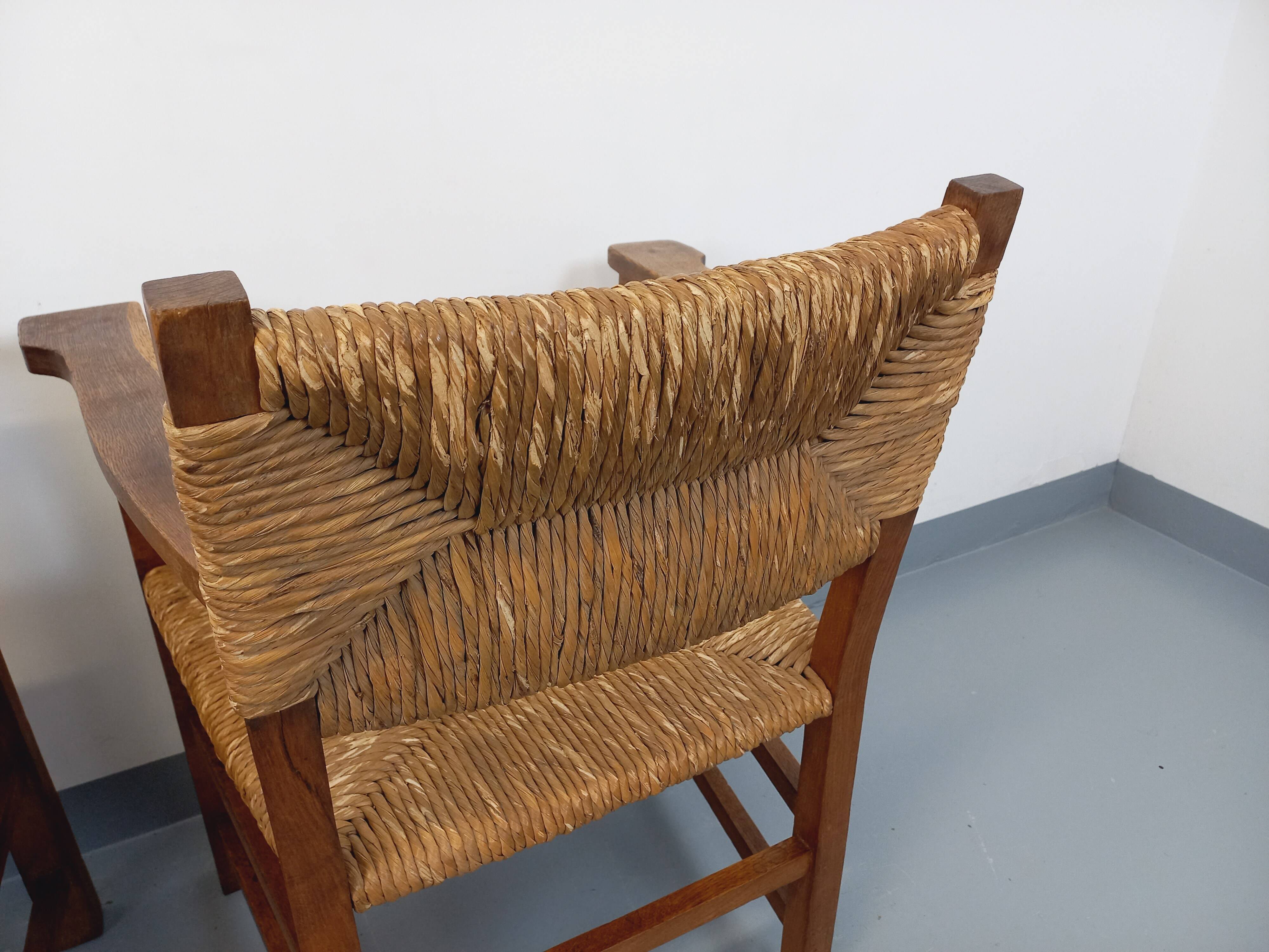 Set of 2 vintage brutalist armchairs in oak wood and straw