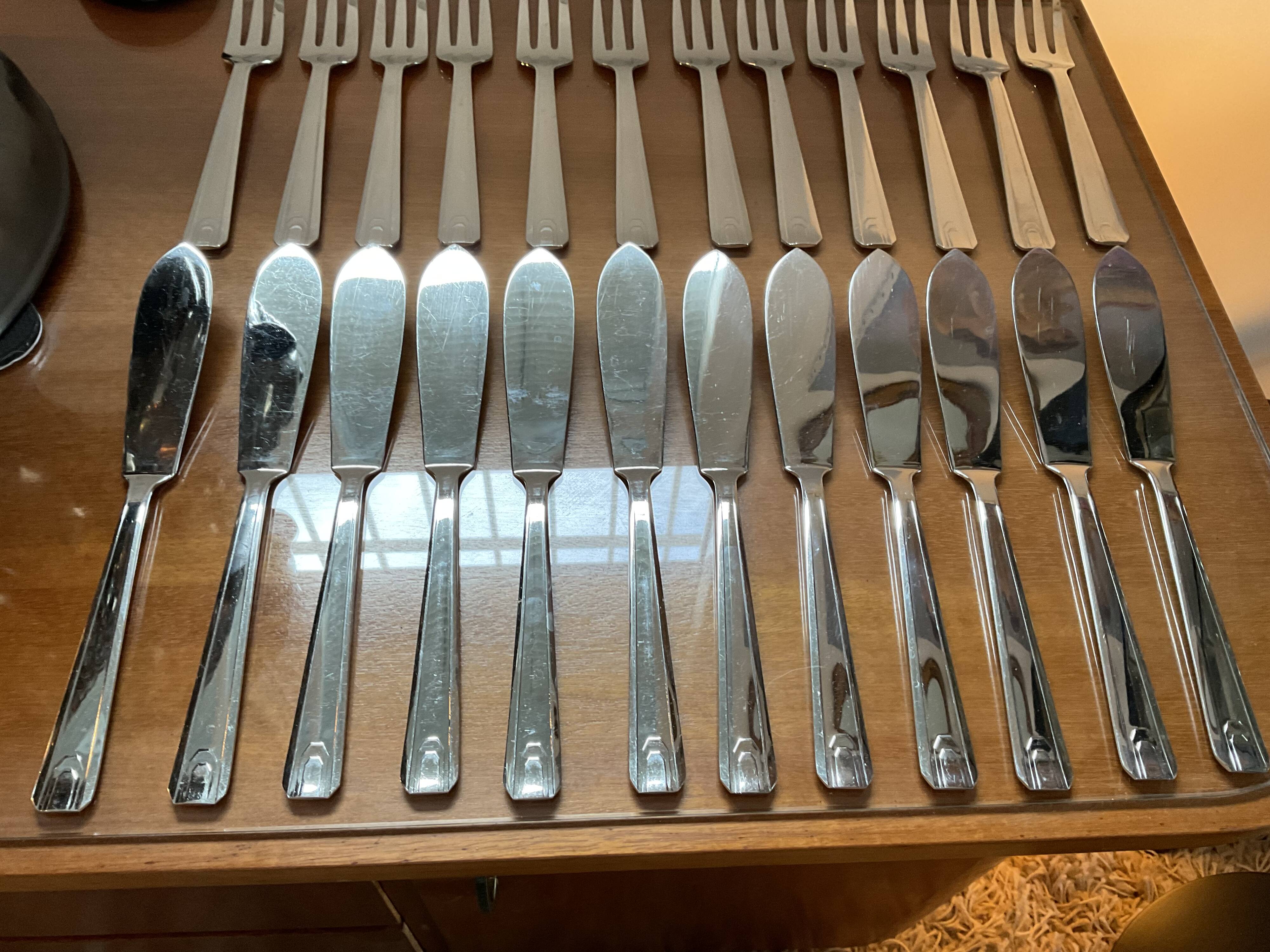 Stainless fish cutlery, 12 knives and 12 forks