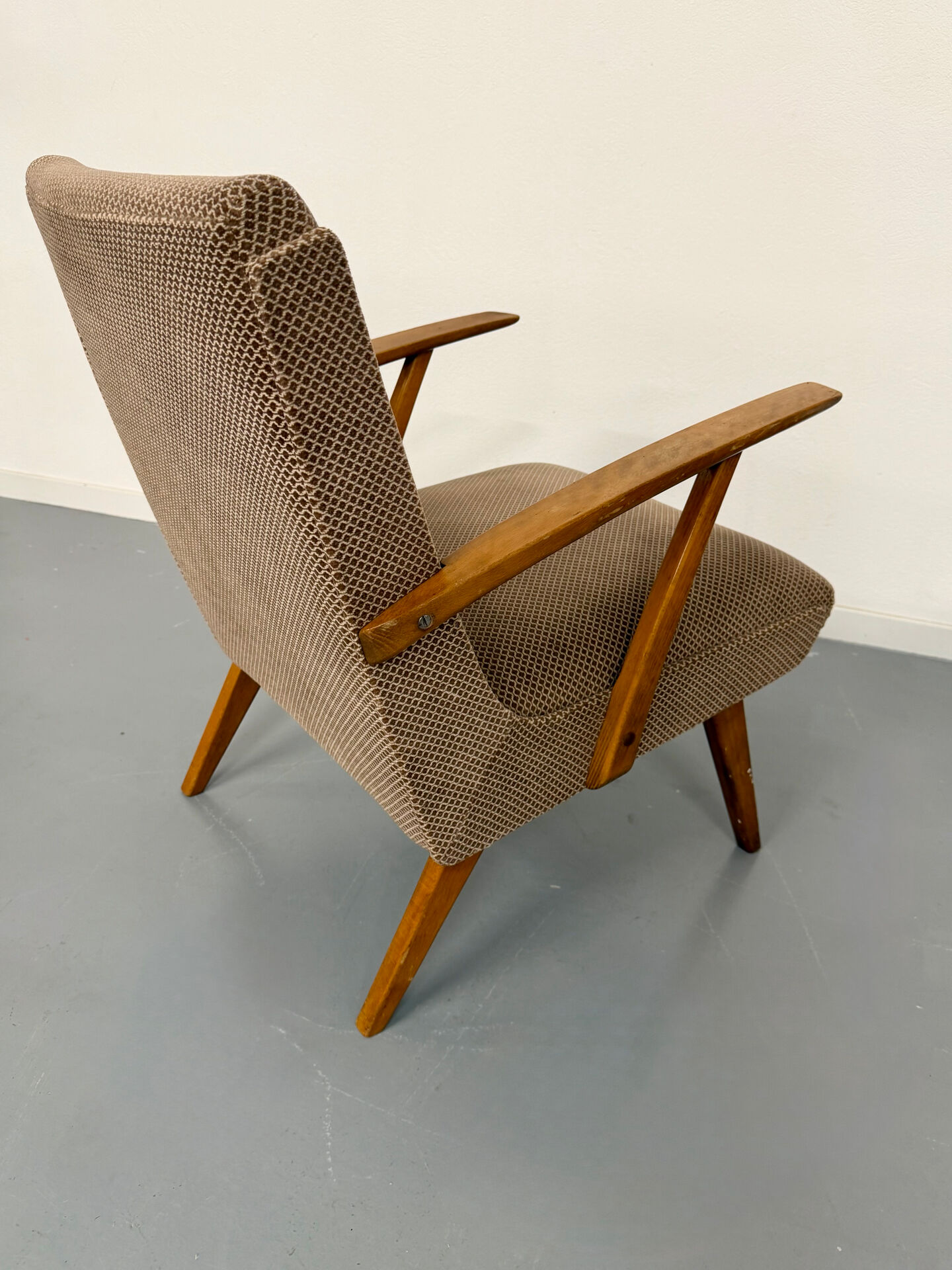 Set of 2 vintage wooden and fabric armchairs designed in the 1960s.