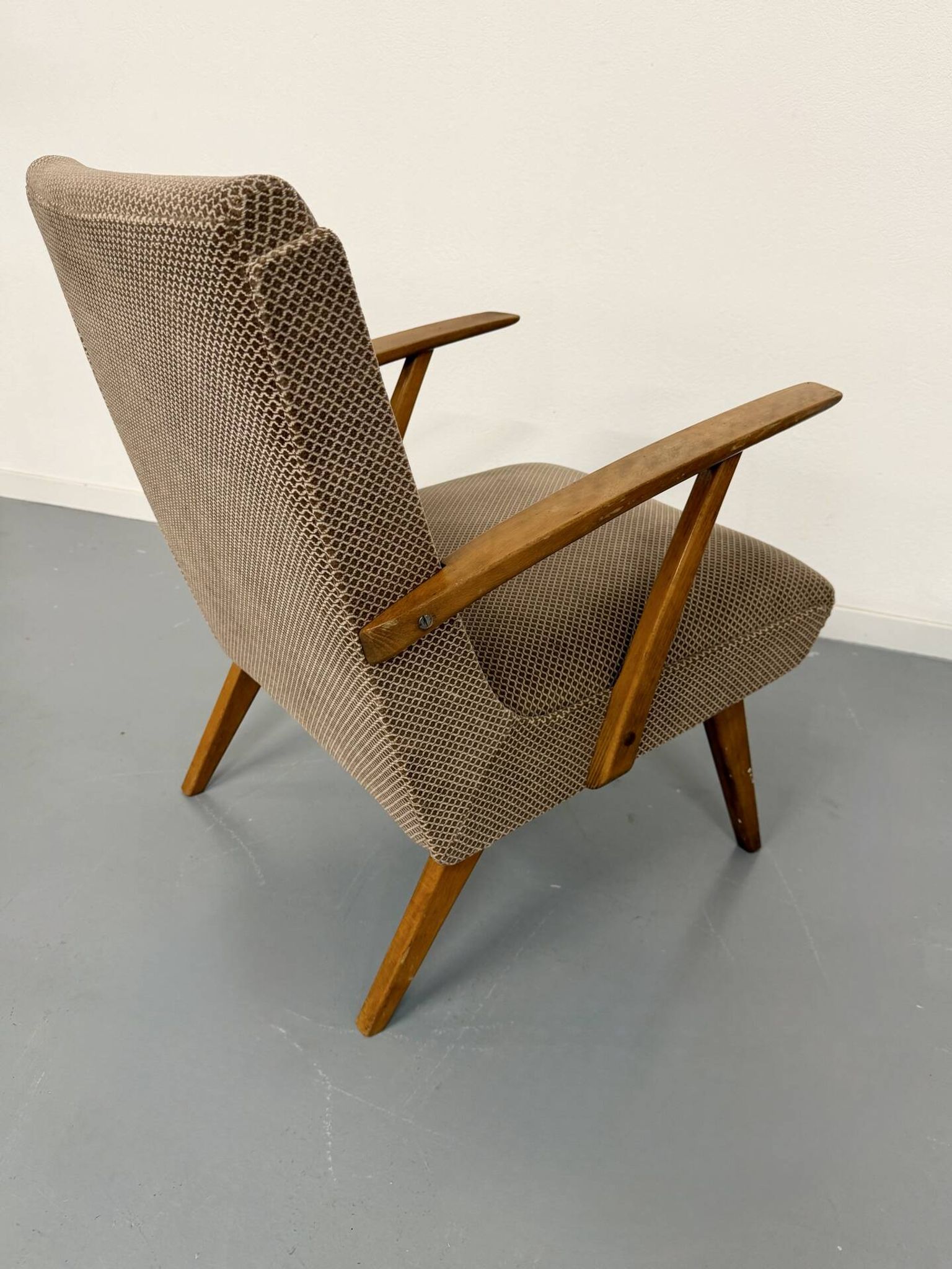 Set of 2 vintage wooden and fabric armchairs designed in the 1960s.