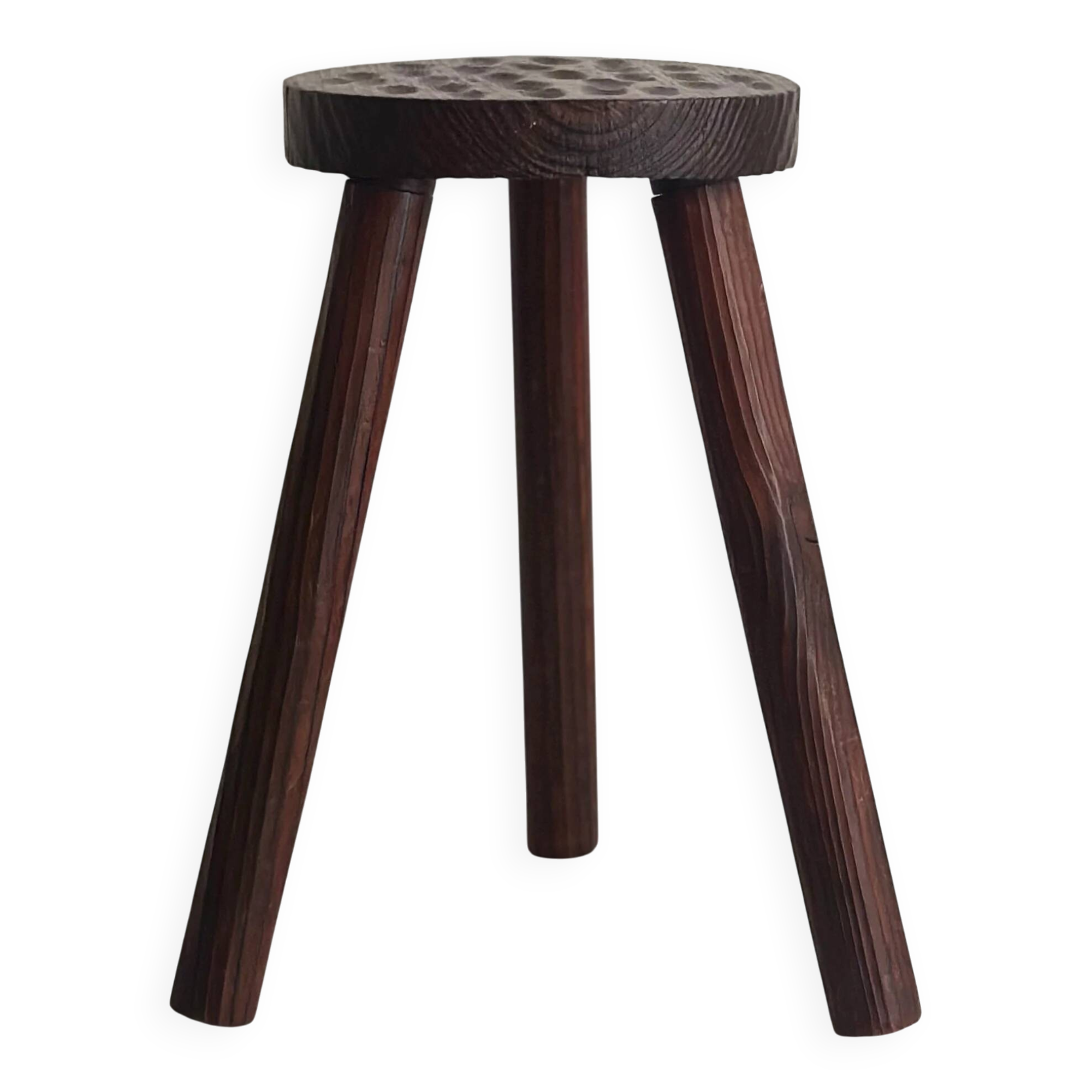 Tripod stool carved with an adze — France, 20th century