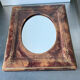 Antique leather framed mirror with gildings 30 cm x  24 cm