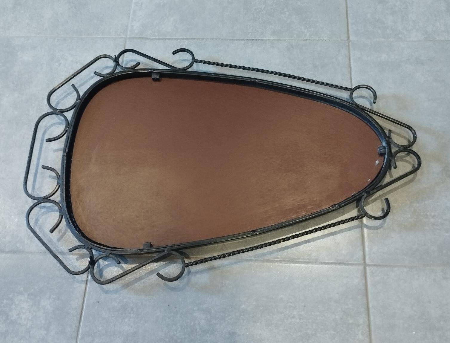 Brutalist antique mirror, sixties era.