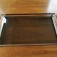 Vintage plateau in smoked glass and chrome metal.