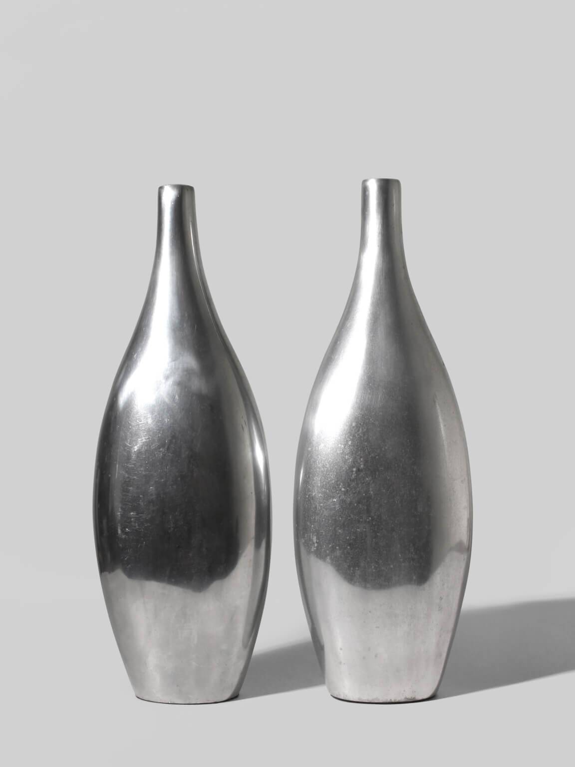 Pair Of Polished Aluminum Tall Vases