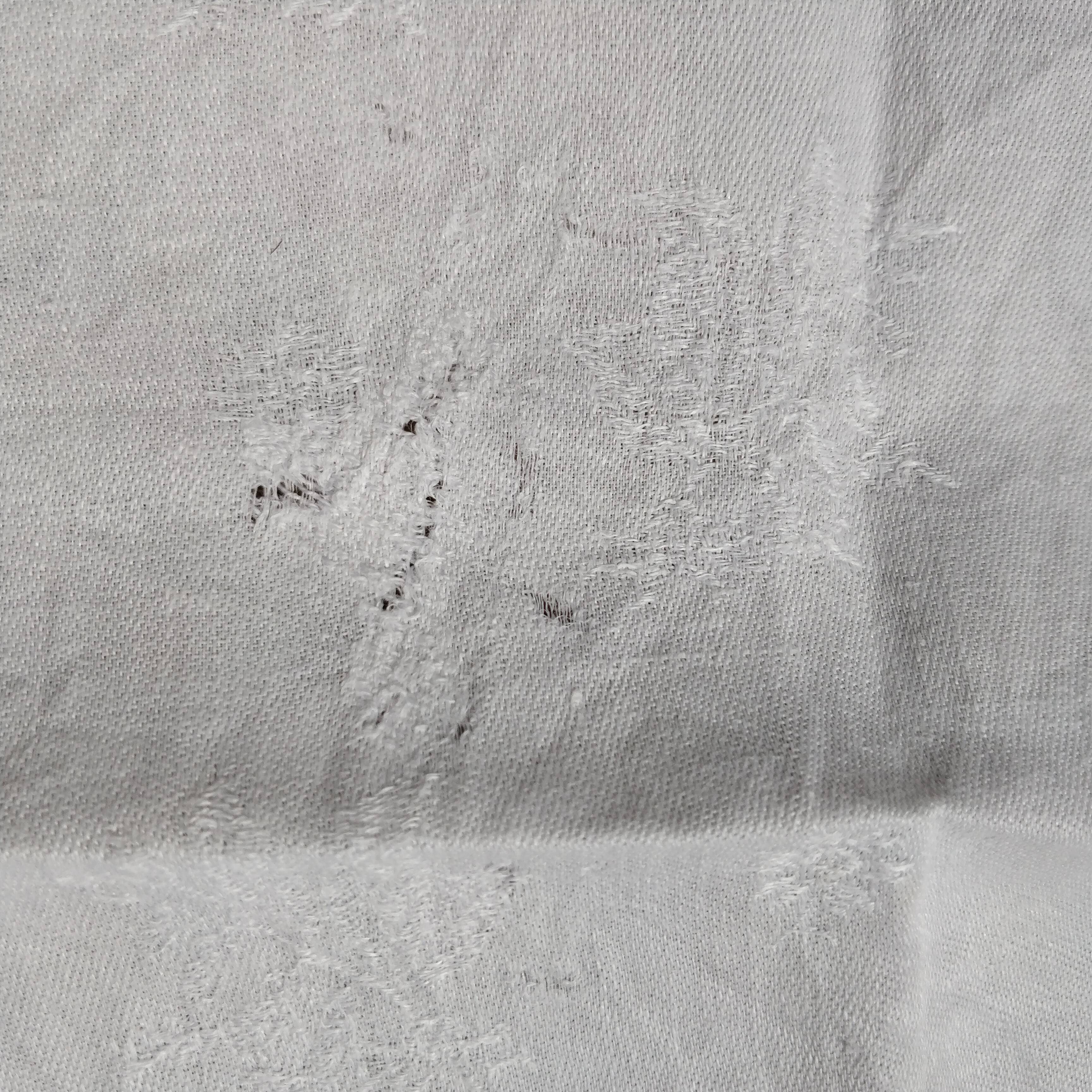 White linen towels embroidered