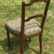 Antique chair seat upholsterer medallions