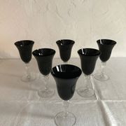 6 stemmed glasses with black glass bowl