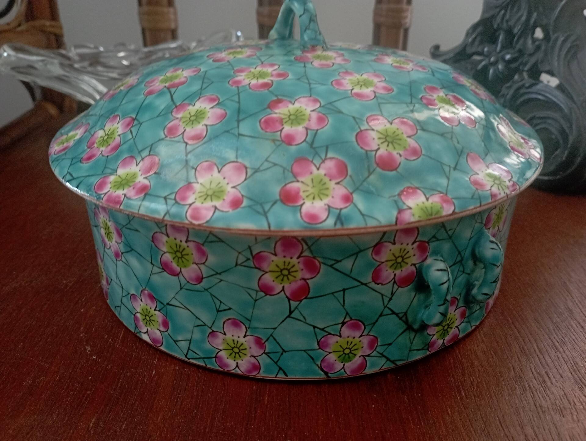 Old glazed ceramic covered pot