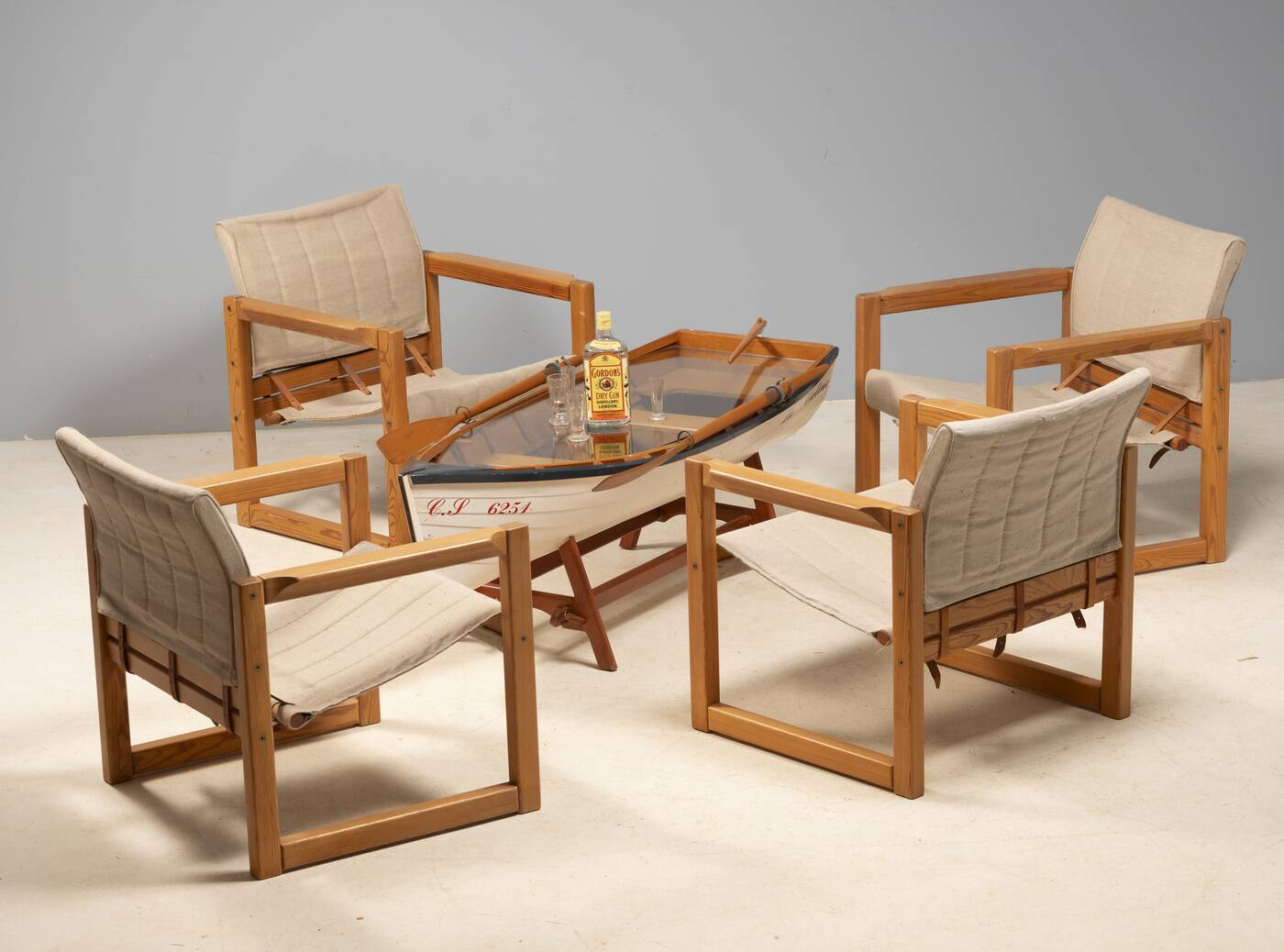 Boat-shaped coffee table reimagined with a glass top, contemporary design (after 2000)