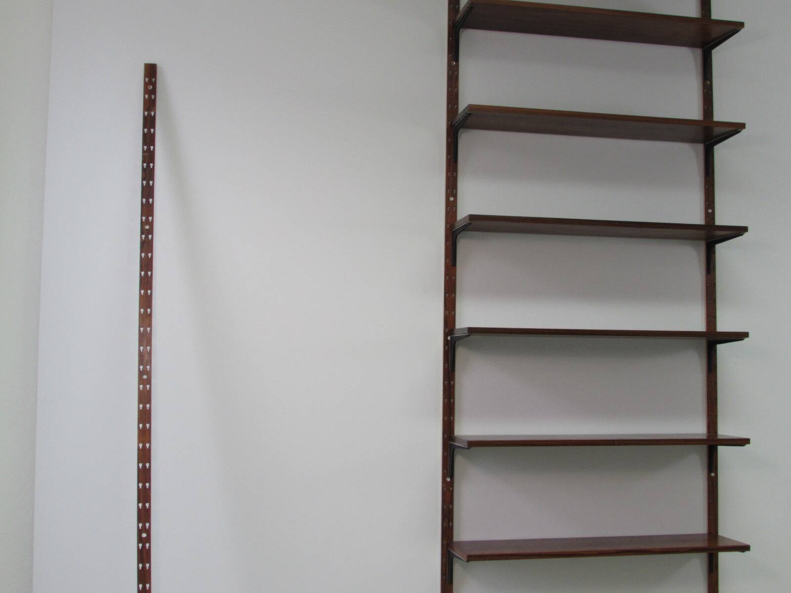 Bookshelf wall system “Excellent” by Sven Ellekaer for Albert Hansen