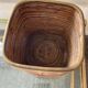 Rattan plant pot rimmed with brass from the 60s and 70s