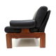 Vintage black leather armchair with solid rosewood frame made in the 1960s
