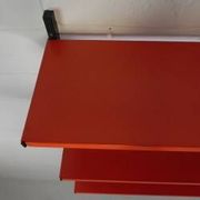 Tomado Holland - A. Dekker wall shelf, orange and black, 1970s