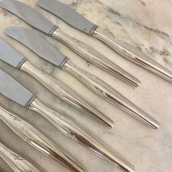 Series of 8 dessert knives, silver metal