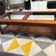 Table basse en merisier plateau verre cannage