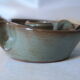 Pair of cellar rat candle holders in glazed sandstone