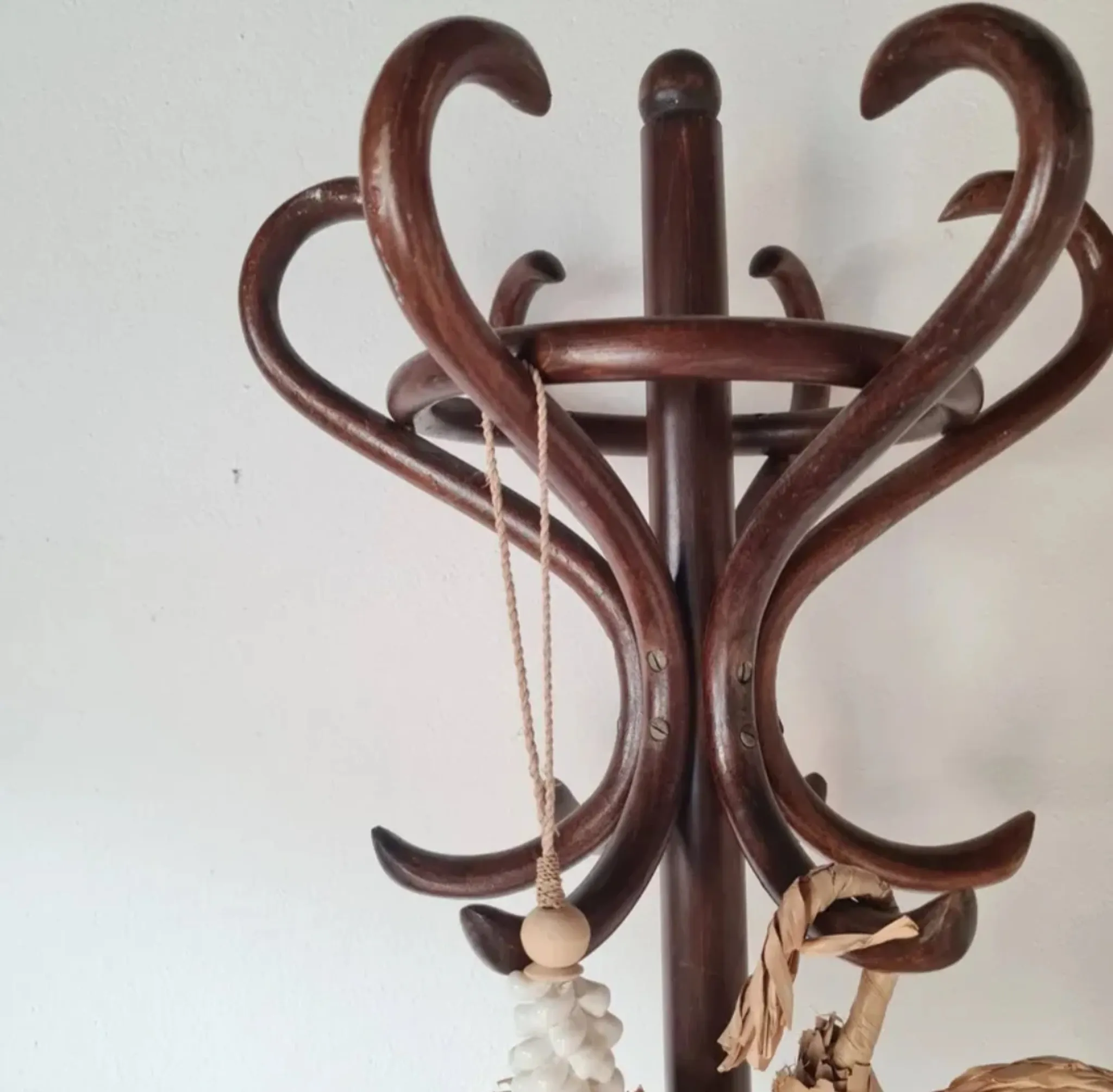 Antique curved wooden coat rack in the Thonet style, 1875.