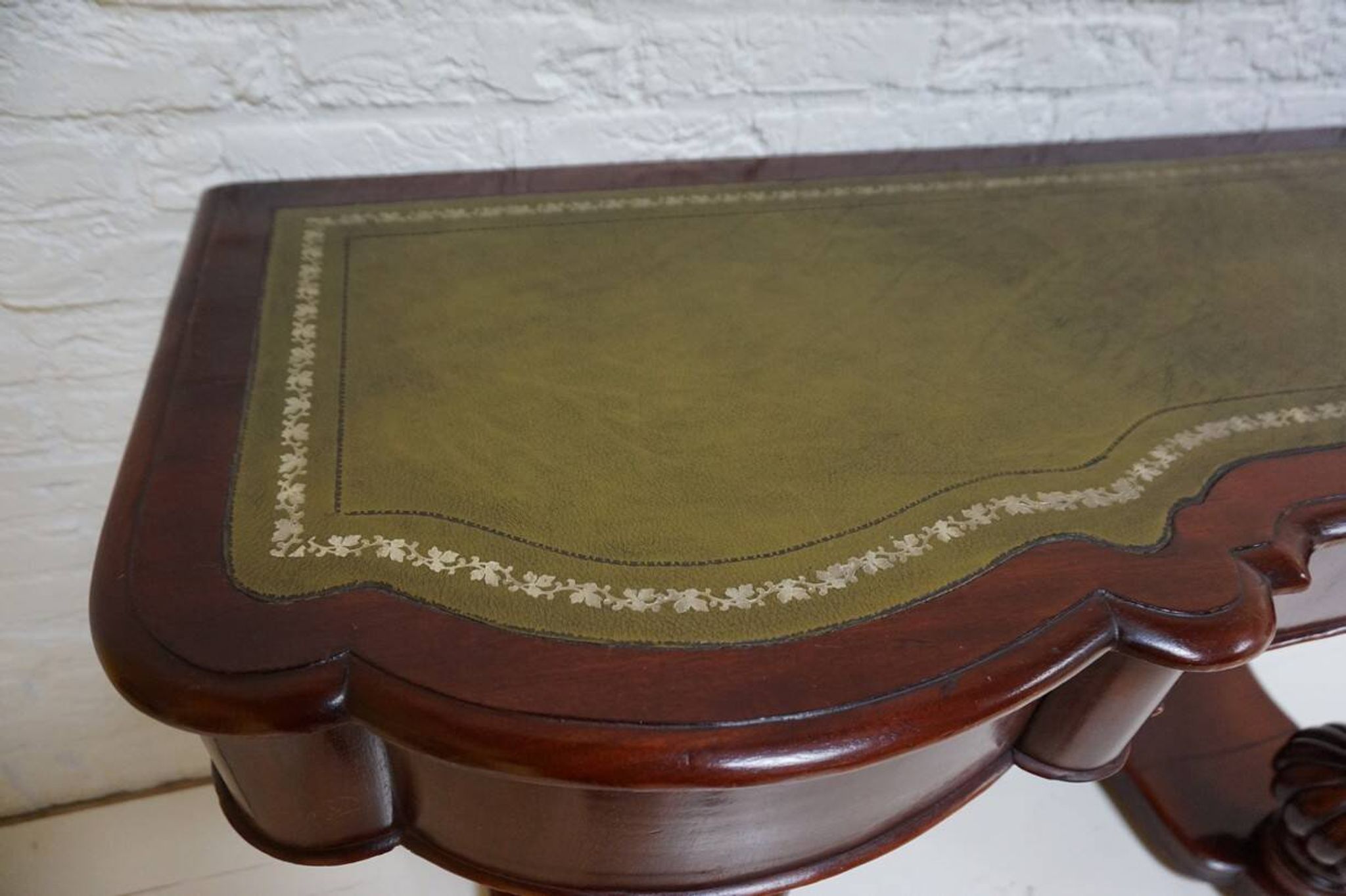 Mahogany and green leather console, 1860-70
