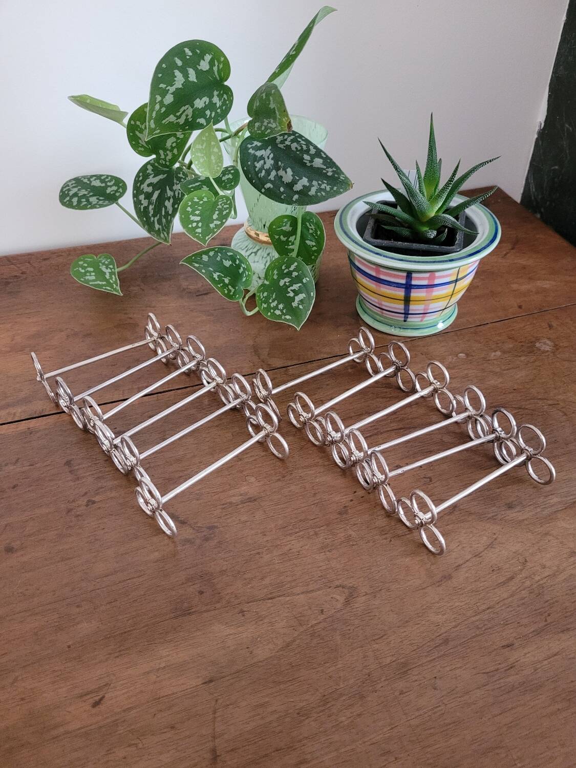 Set of 12 silver Cailar-Bayard knife rests