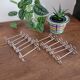 Set of 12 silver Cailar-Bayard knife rests