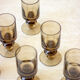 6 glasses in smoked glass foot