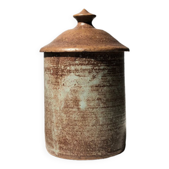 Old lid pot in brown ceramic