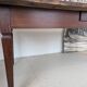 Campaign table in solid oak, Directoire style.