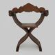 Vintage Savonarola chair with lion head, wood, Italy, 1950s