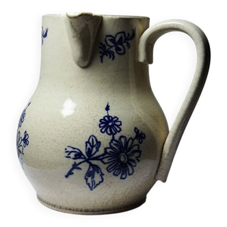Fine earthenware pitcher with blue decoration, attributed to Saint-Uze, 19th century.