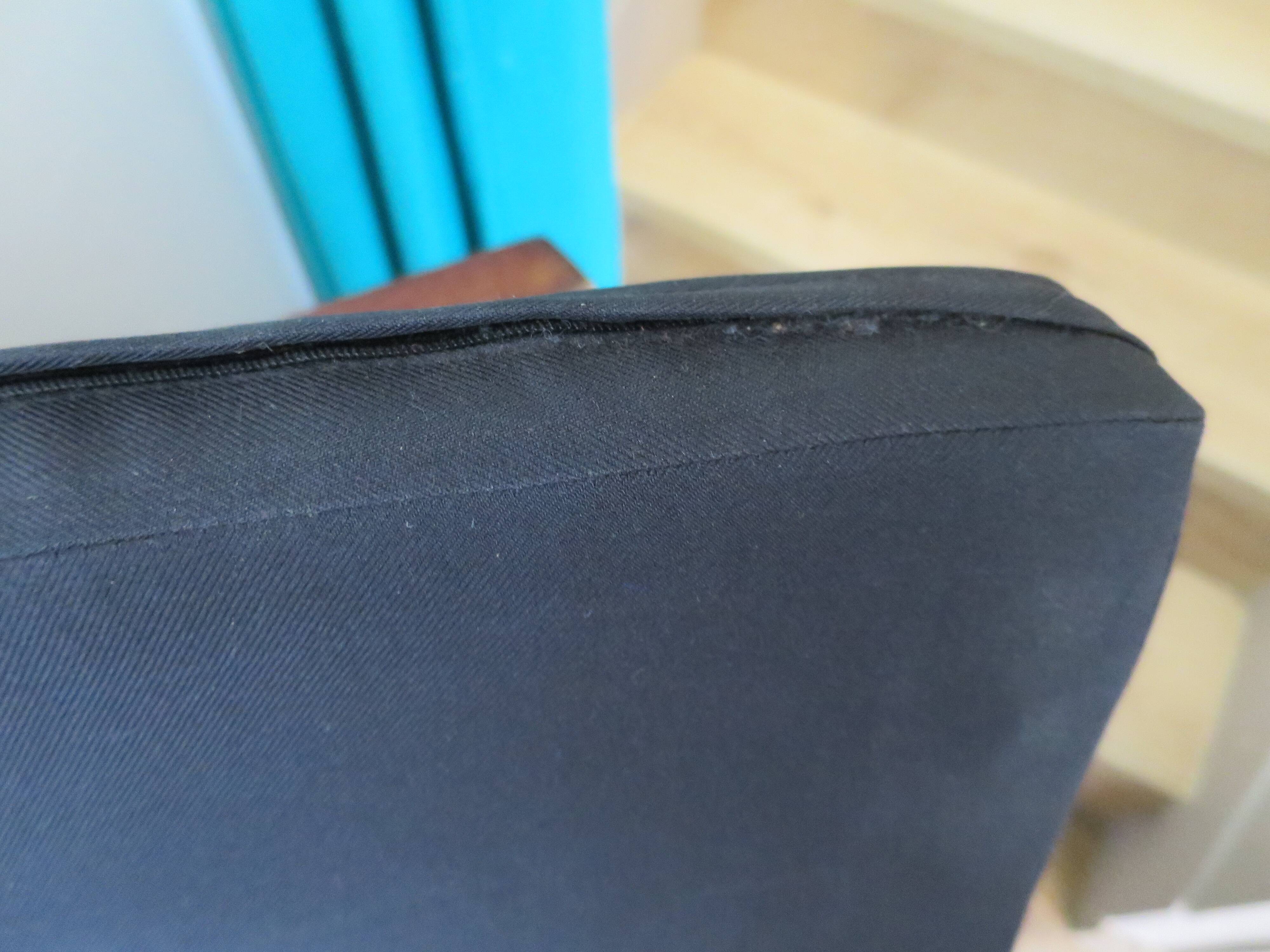 2 colonial-style armchairs in woven rattan and exotic wood